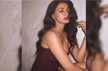 Disha Patani looks party ready in a fabulous burgundy slip dress